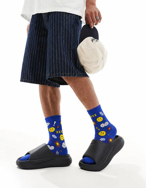 Men's yellow smiley crew socks - side view