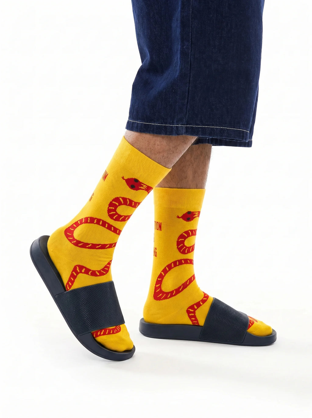 Men's yellow crew socks with red snake design - side view 1